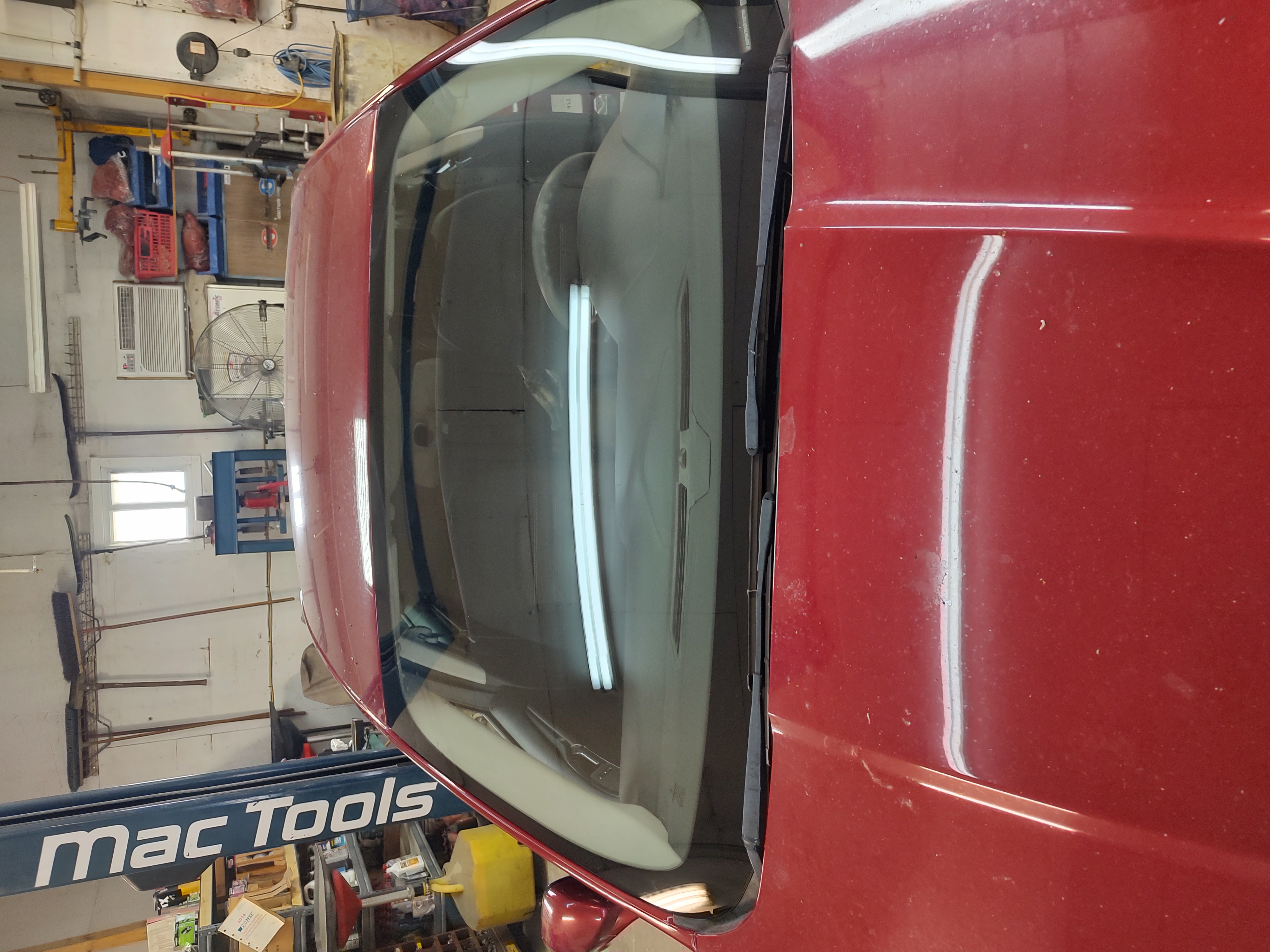 Red car with intact windshield